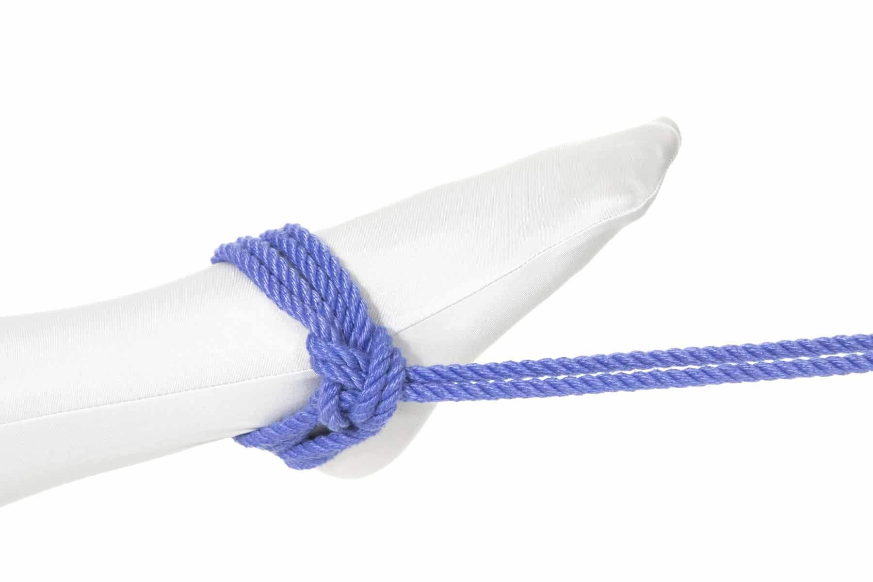 A single column tie demonstrated around a wrist